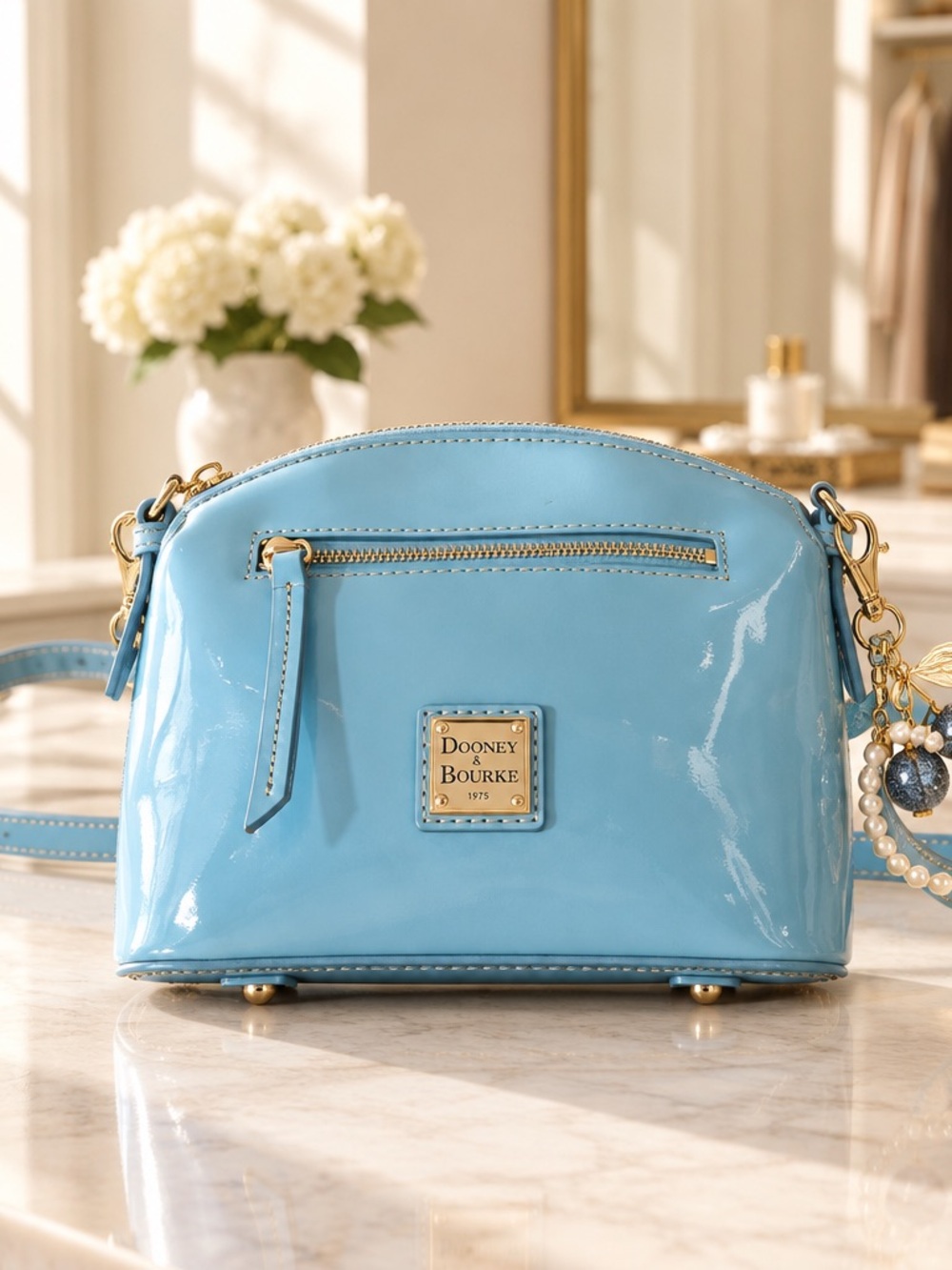 Dooney & Bourke Sky Blue Patent Leather Crossbody with Gold Hardware